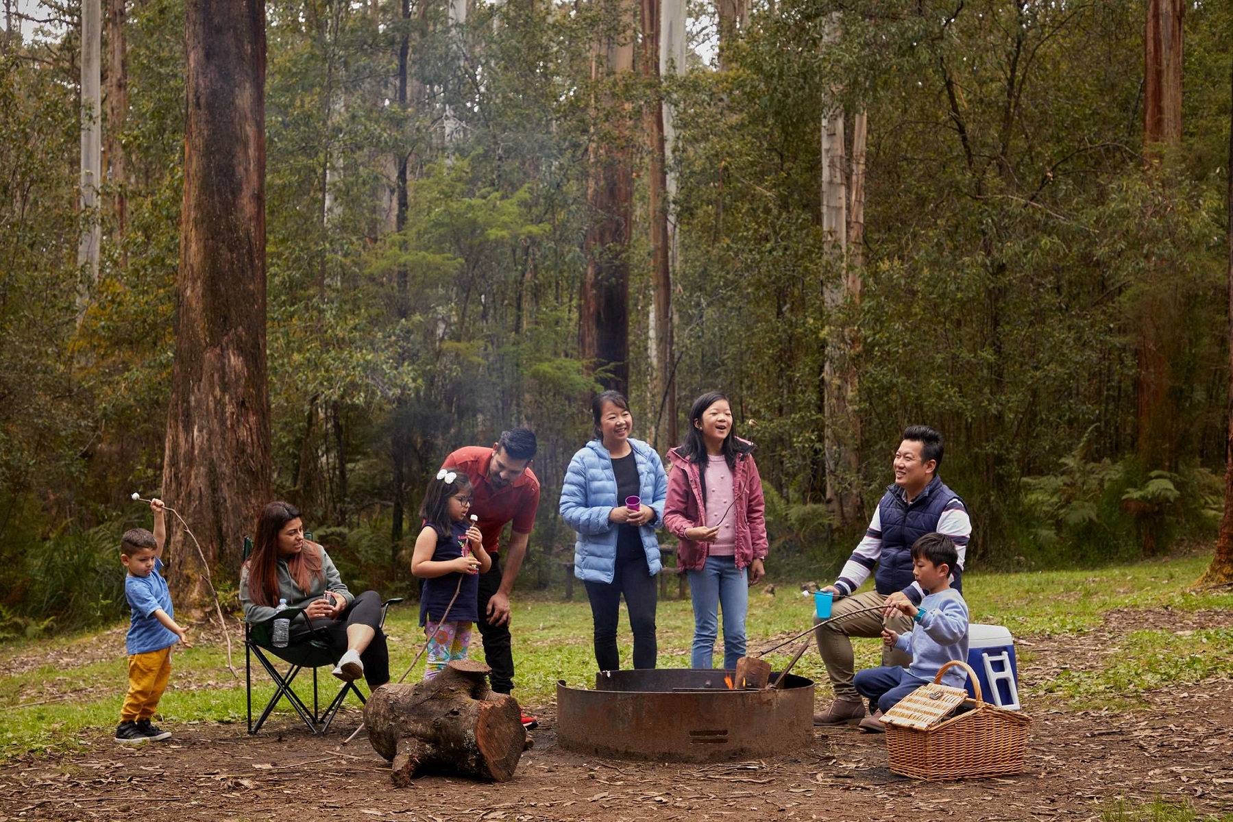 Family enjoying campfire photo